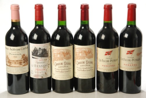 Chateau Fleur Petrus 1999 Pomerol 1 Bt Chateau Fleur Petrus 2002 Pomerol 1 Bt Chateau L'Evangile 1999 Pomerol 1 Bt Vieux Chateau Certan 2002 Pomerol 1 Bt Chateau Belair Dubois Challon Premier Grand Cru Classe 1999 Saint Emilion Grand Cru 2 Bts Above 6 Bts