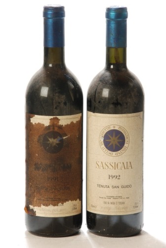 Sassicaia 1991 Severely stained label 1 Bt Sassicaia 1992 1 Bt Above 2 Bts